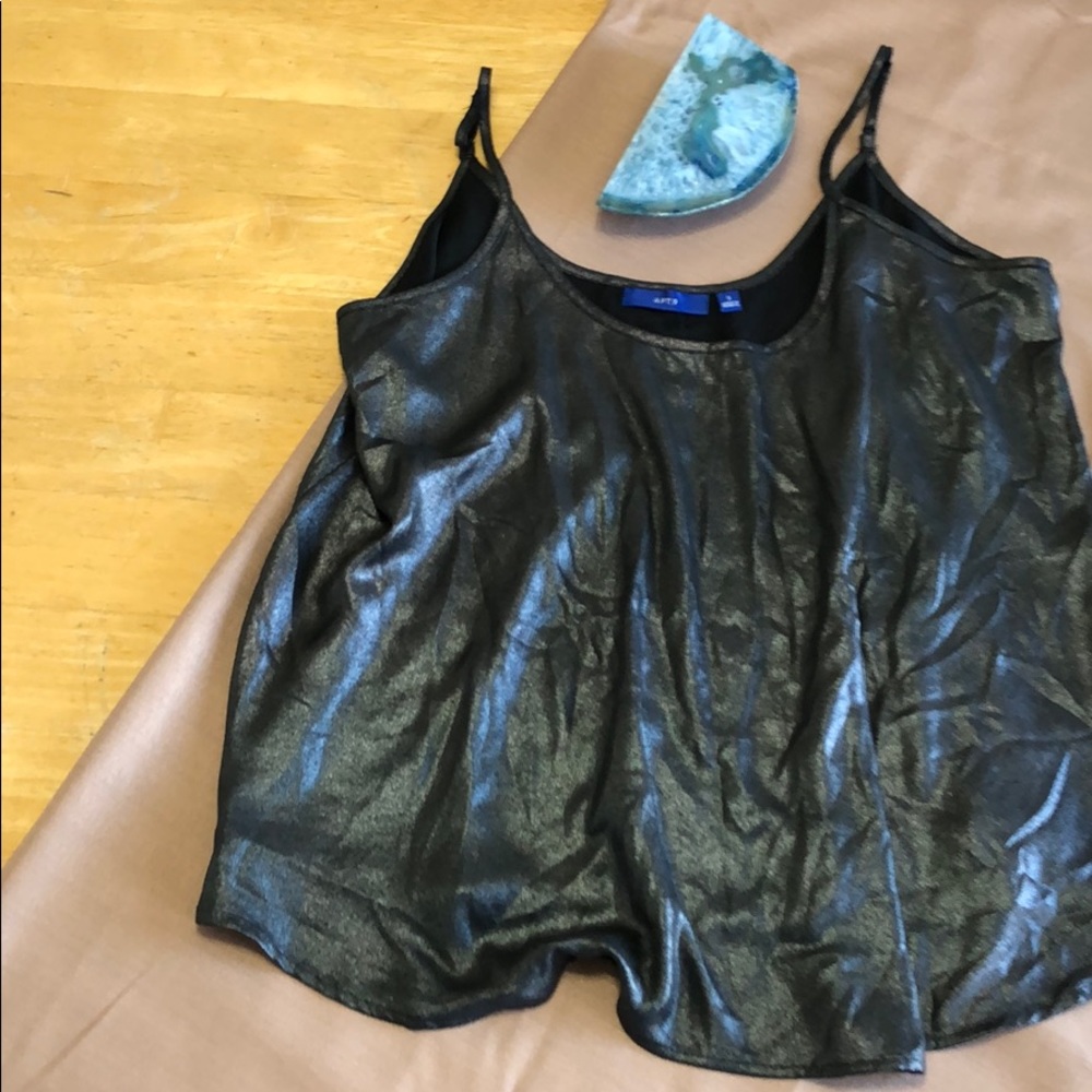 Flowy, metallic silver/gray tank top.